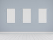 3D Stimulate of minimal room with three white blank picture frames on the center of white plank wood floor and pastel color wall.