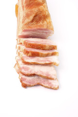 bacon sliced on white background. pork fat with veins.