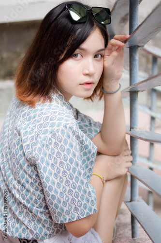 Portrait Of Thai Adult Beautiful Girl Short Hair Relax And