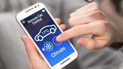 Controlling the climate control temperature of a car from a smartphone app from home.