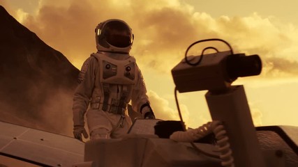 Wall Mural - first astronaut on the mars, checking his rover and exploring site near his base/ research center. s