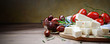 Feta cheese with kalamata olives, tomatoes and rosemary on a wooden background with space for text