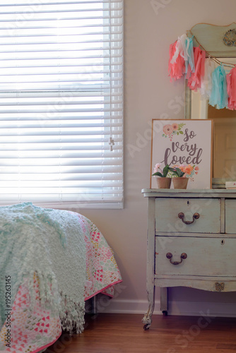 Girls Bedroom Decor With Vintage Dresser In Pastel Mint Green