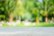 © tirachard - Stone board empty table in front of blurred background. Perspective gray stone over blur trees in forest - can be used for display or montage your mock up products. Spring and summer season.