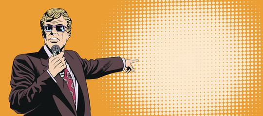 Wall Mural - Businessman with microphone points with his finger.