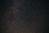 Fototapeta Desenie - Background of gray starry night sky with the Milky Way