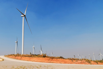Wall Mural - concept idea eco power energy. wind turbine on hill at thailand