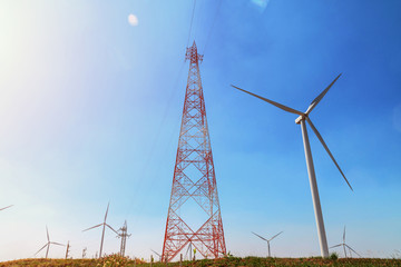 Wall Mural - concept idea eco power energy. wind turbine on hill with sunset
