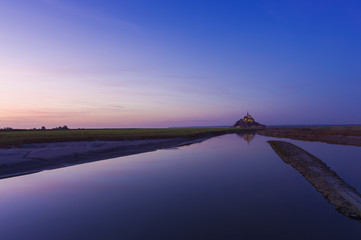 Wall Mural - Mont Saint Michel castle and river at sunset, France