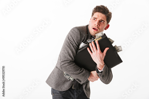 Cuadros en Lienzo Portrait of a terrified young businessman