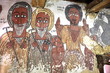 wall mural of saints and iconographic scenes, painted in naive african christian style, on church wall in Ethiopia 