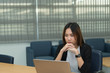 © reewungjunerr - Asian businesswoman stress from hard work,Thai worker woman working in the office,Dark tone