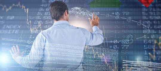 Poster - Composite image of businessman in blue shirt using interface