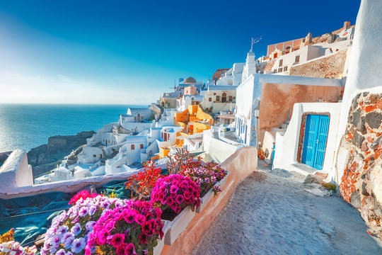 santorini, greece. picturesq view of traditional cycladic santorini houses on small street with flow