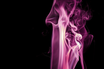 Purple smoke on black background