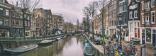 Cityscape, Panorama - View Of City Channel With Boats, City Of Amsterdam, The Netherlands.