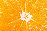Fototapeta  -  Slice of orange, macro, above view.