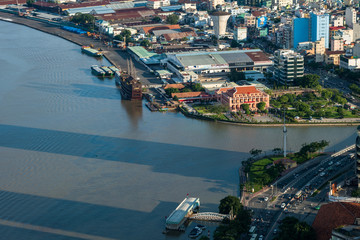 Wall Mural - HO CHI MINH, VIETNAM - NOV 20, 2017: Royalty high quality stock image aerial view of Ho Chi Minh city, Vietnam. Beauty skyscrapers along river light smooth down urban development in Ho Chi Minh City