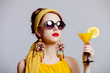 Poster - girl in 70s clothes style with tropical cocktail