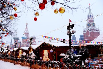 Wall Mural - New Year and Christmas market and decorations on Red Square. St. Basil's Cathedral.

