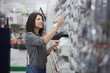 © Stocked House Studio - woman working at hardware store