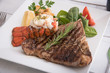 grilled lobster tail and T bone steak