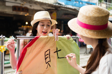 Canvas Print - Writing wishes on the lantern in Ping Si