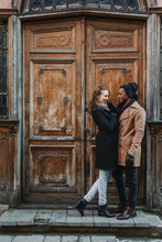Couple Embraced At Vintage Door
