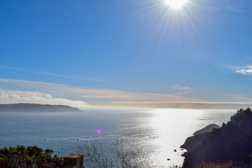 Beautiful view over the ocean, sun is shining over the sea, warm light, San Francisco, USA