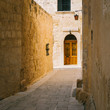 Narrow street of ancient Silent City, Mdina, Malta
