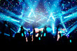 © Platoo Studio - Abstract Party Background - Crowd People Enjoy Dancing and Show Hands Up in the Concert with Beautiful Lighting and Laser
