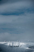 Radar Domes On A Snow Covered Mountain