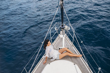Woman Enjoying Vacation On Sailboat
