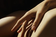 © Sonja Lekovic/Stocksy - hand touching the body closeup