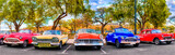 Fototapeta Miasta - Colorful group of classic cars in Old Havana, an iconic sight in Cuba