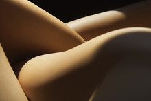 Naked Body Composition In Light And Shadows