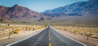 © Christian Tisdale/Stocksy - Long straight road in the desert leading off into the mountains