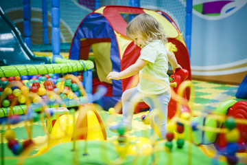 child is playing in the children's room. children in the entertainment center. fun in the children's