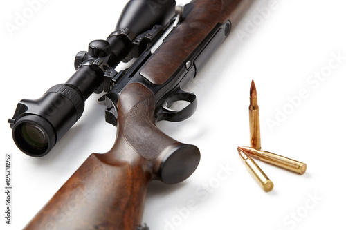 Cuadros en Lienzo Hunting rifle and ammunition isolated on white background