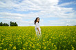 © евгений ставников - beautiful young girl in a white dress in a field of flowers