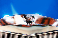 Emblem And Radiator Grill In Blue Retro Car