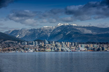 Rocky Mountains And Buildings, North Vancouver, British Colombia, Canada.