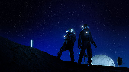 Wall Mural - two astronauts in space suits stand on the moon looking at the beautiful nght sky full of stars. in 
