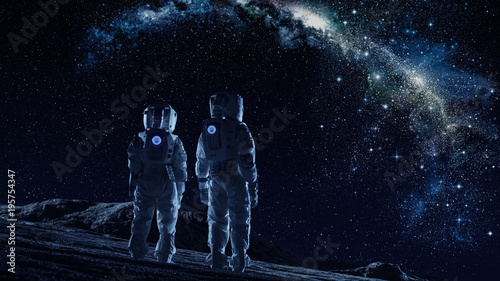 Fotografía Crew of Two Astronauts in Space Suits Standing on the Moon Looking at the The Milky Way Galaxy