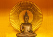 Golden buddha meditation with gold color background.
