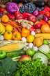 Vegetables and fruits large mix group overhead on colorful background
