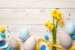 Easter Background with Easter Eggs and Spring Flowers