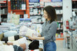 © Stocked House Studio - young beautiful woman - shopping at supermarket