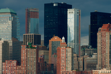  Binoculars view of lower Manhattan during buildings during early evening.