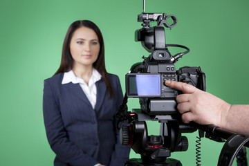 Live news broadcast. Blur image of newscaster. TV host looking at the camera